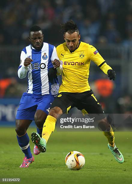 Pierre-Emerick Aubameyang of Borussia Dortmund and Silvestre Varela of FC Porto compete for the ball during the UEFA Europa League round of 32 first...