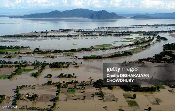 View from an Indian army helicopter shows the floodplain of the River Barapeta, some 80kms north-west of Guwahati, 26 July 2004. The death toll from...