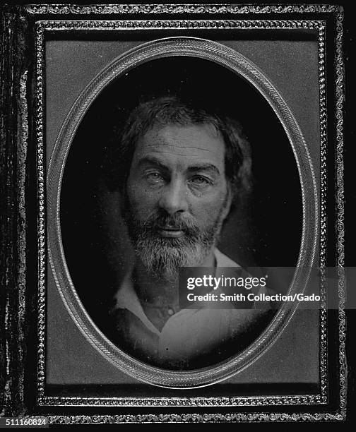 Framed, oval daguerreotype portrait of Walt Whitman, American poet, essayist and journalist, 1853. From the New York Public Library. .