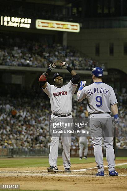 David Ortiz of the Boston Red Sox celebrates his home run with during the 2004 All-Star Game at Minute Maid Field on July 13, 2004 in Houston, Texas....