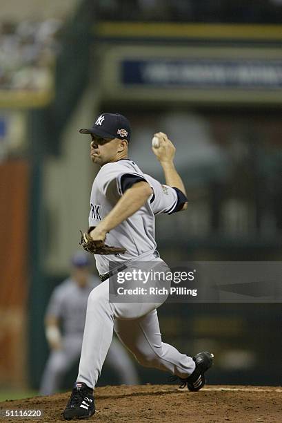 Javier Vasquez of the New York Yankees throws a pitch during the 2004 All-Star Game at Minute Maid Field on July 13, 2004 in Houston, Texas. The...