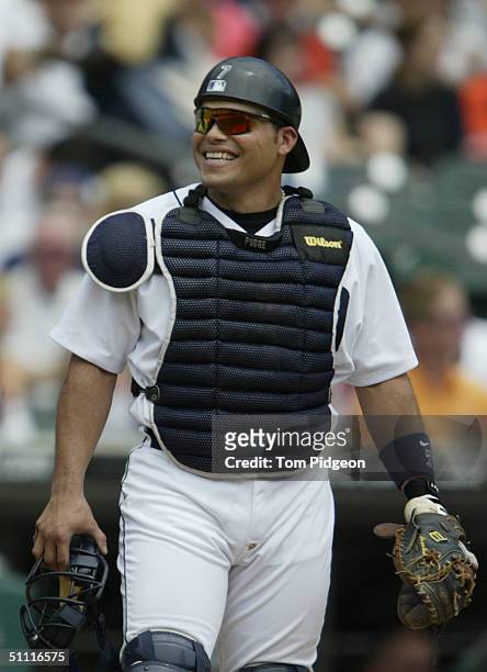 Catcher Ivan Rodriguez of the Detroit Tigers smiles during the game against the New York Yankees at Comerica Park on July 18, 2004 in Detroit,...