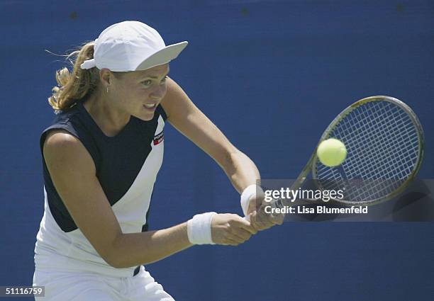 Elena Bovina of Russia returns a shot to Francesca Schiavone of Italy during the first round of the Acura Classic on July 26, 2004 at La Costa Resort...