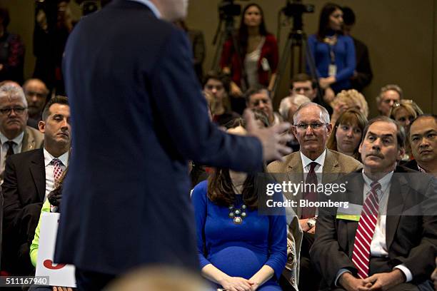 Attendees listen as Jeb Bush, former Governor of Florida and 2016 Republican presidential candidate, speaks during a town hall event at the Columbia...