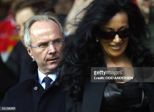 London, UNITED KINGDOM: This file photo shows England's Swedish manager Sven Goran Eriksson and partner Nancy Dell'Ollio arriving to see Arsenal and...