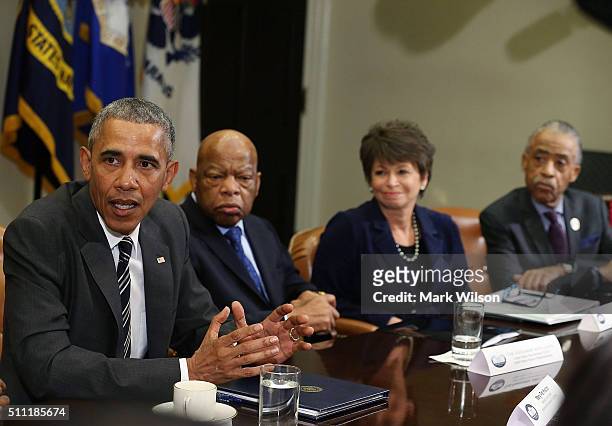 President Barack Obama speaks about race relations while flanked by , Rep. John Lewis , Senior Advisor Valerie Jarrett, and Rev. Al Sharpton, in the...