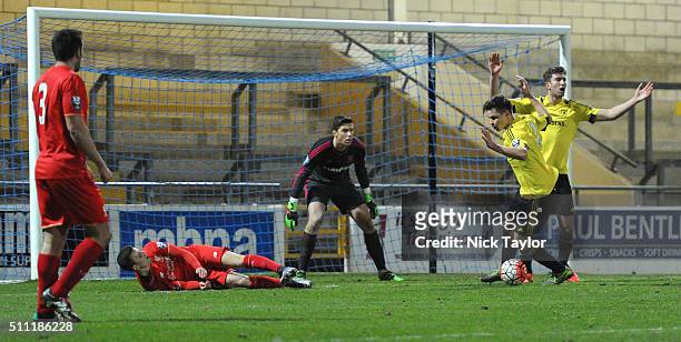 Brooks Lennon of Liverpool is fouled in the penalty area by Callum Johnson )2) of Middlesbrough during the Liverpool v Middlesbrough Barclays U21...