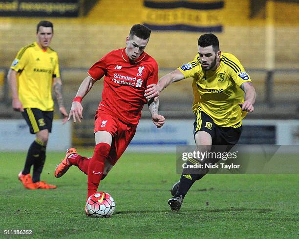Ryan Kent of Liverpool and Robbie Tinkler of Middlesbrough in action during the Liverpool v Middlesbrough Barclays U21 Premier League game at the...