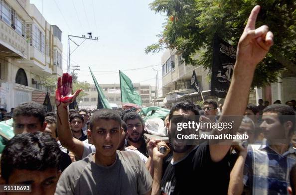 The bodies of 22 year-old Hamas militant Fadi Al Mughni and 29... News ...