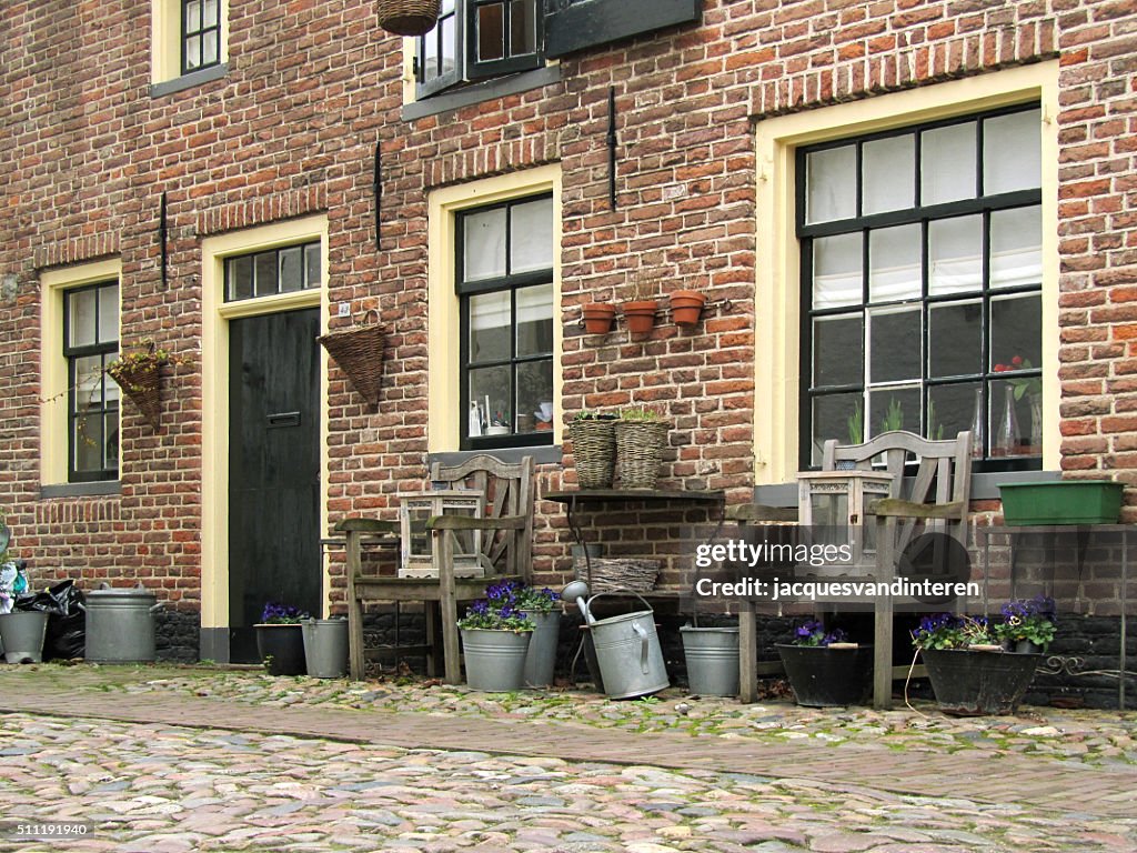 Street and part of historic house, Elburg, The Netherlands