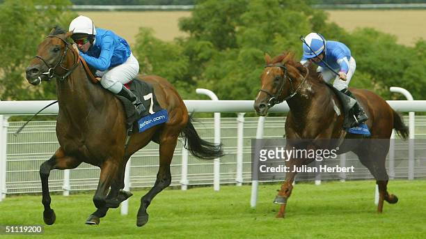 Kerin McEvoy and The Godolphin trained Byron land The Betfair Cup Race run at Goodwood Racecourse on July 27, 2004 in Goodwood, England.