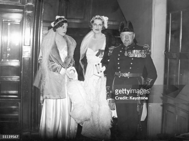British statesman Winston Churchill his wife Clementine and their daughter Sarah, leaving for an appointment at Buckingham Palace, 11th May 1933.