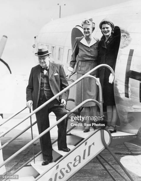 British Prime Minister Winston Churchill his wife Clementine and their daughter Mary boarding a Swissair plane at Biggin Hilll taking them on holiday...