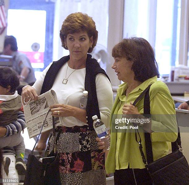 Susan Caudillo, Scott Peterson's sister and Jackie Peterson, Scott's mother, clear check in at the San Mateo County Courthouse July 27, 2004 in...