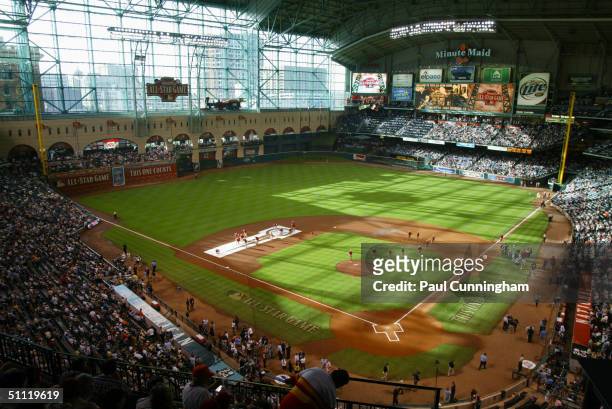 Stadium ground crew prepare the infield prior to the 2004 Major League Baseball All-Star Game at Minute Maid Park on July 13, 2004 in Houston, Texas.