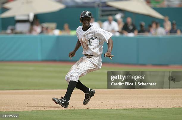 Center fielder Juan Pierre of the Florida Marlins focuses on home plate as he starts to run during the game against the New York Mets at Pro Player...