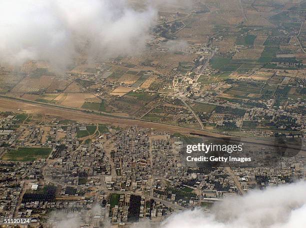 An aerial photo taken March 12. 2004 and provided by the left-wing Israeli movement Peace Now July 27, 2004 shows the Israel's Philadelpia buffer...