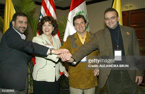 Head negociators for the Tratado de Libre Comercio : Hernando Jose Gomez of Colombia, Regina Vargo of the United States, Pablo de la Flor of Peru and...