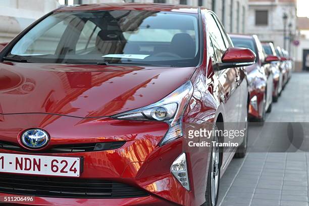 toyota prius iv in a row - toyota prius stock pictures, royalty-free photos & images