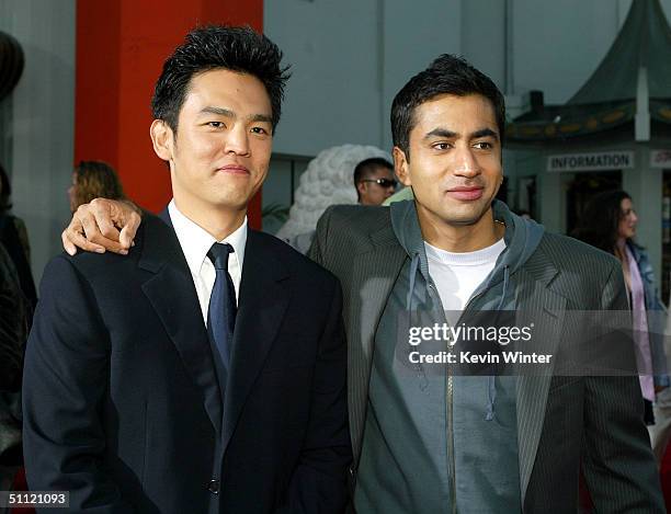 Actors John Cho and Kal Penn arrive at the World Premiere of "Harold & Kumar Go to White Castle" at the Grauman's Chinese Theatre on July 27, 2004 in...