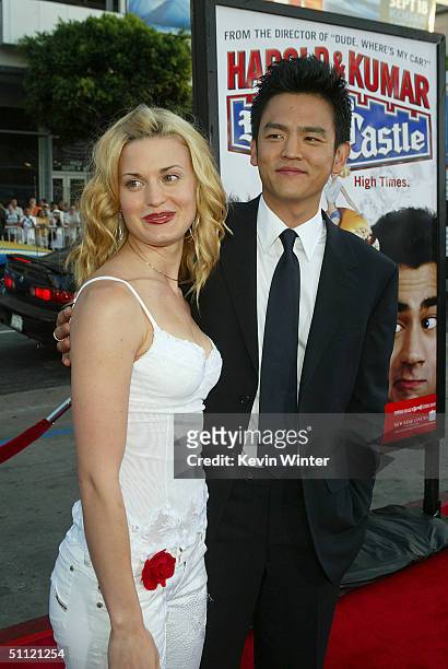Actress Brooke D'Orsay and actor John Cho arrive at the World Premiere of "Harold & Kumar Go to White Castle" at the Grauman's Chinese Theatre on...