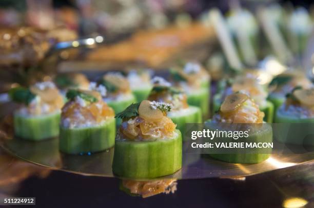 View of the the smoke salmon mousse on cucumber during the Oscar Governors Ball preview, in Hollywood, California, on February 18, 2016.