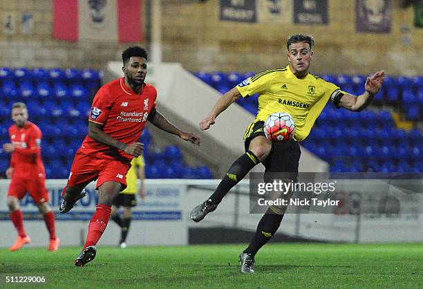 Jerome Sinclair of Liverpool and Jonathan Burn of Middlesbrough in action during the Liverpool v Middlesbrough Barclays U21 Premier League game at...