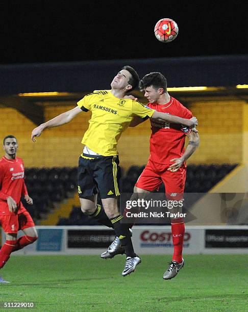 Joe Maguire of Liverpool and Arnel Jakupovic of Middlesbrough in action during the Liverpool v Middlesbrough Barclays U21 Premier League game at the...