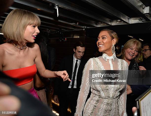 Singers Taylor Swift and Beyonce attend The 58th GRAMMY Awards at Staples Center on February 15, 2016 in Los Angeles, California.