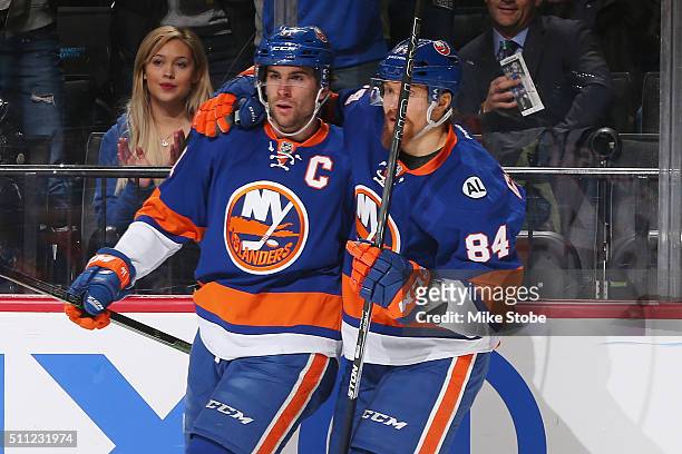 John Tavares of the New York Islanders celebrates his first period goal with Mikhail Grabovski against the Washington Capitals at the Barclays Center...
