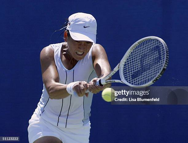 Ai Sugiyama of Japan returns the ball to Shinobu Asagoe of Japan during day three of the Acura Classic on July 28, 2004 at La Costa Resort and Spa in...