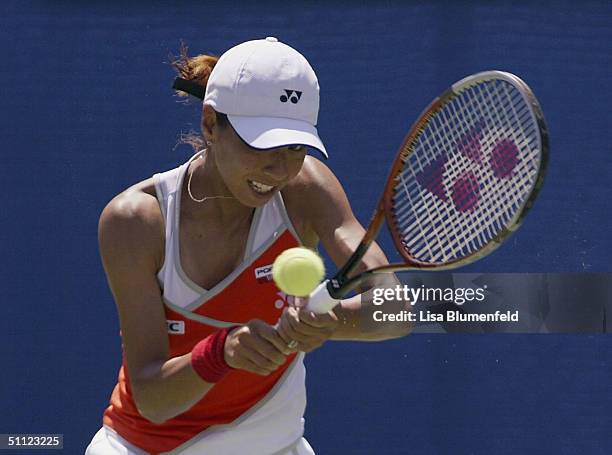 Shinobu Asagoe of Japan returns the ball to Ai Sugiyama of Japan during day three of the Acura Classic on July 28, 2004 at La Costa Resort and Spa in...