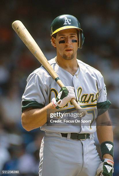 Walt Weiss of the Oakland Athletics looks on from the on-deck circle against the New York Yankees during an Major League Baseball game circa 1988 at...