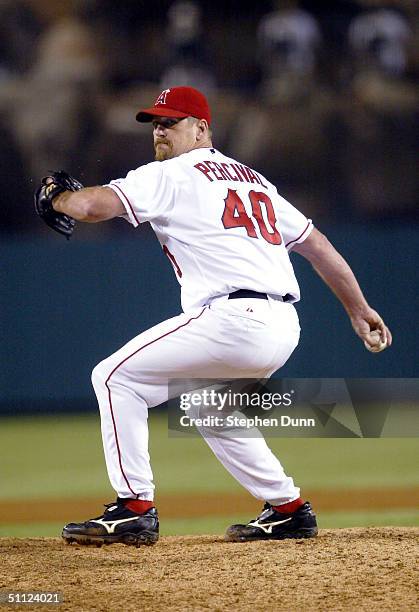 Relief pitcher Troy Percival of the Anaheim Angels throws a pitch in the ninth inning on his way to recording his 300th career save against the Texas...