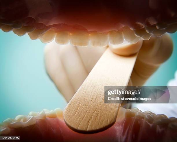 healthcare - tongue depressor stock pictures, royalty-free photos & images