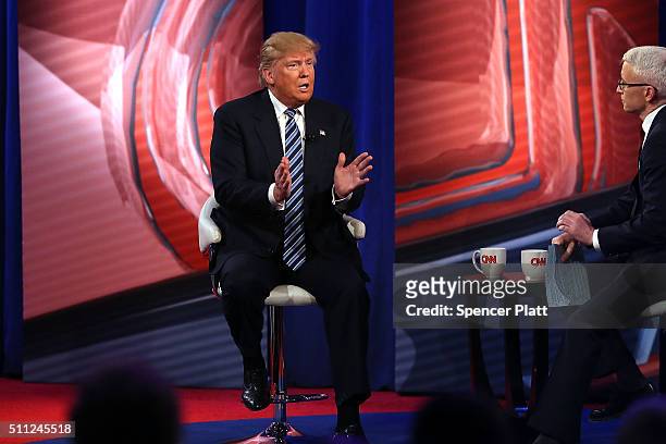 Republican presidential candidate Donald Trump speaks at a CNN South Carolina Republican Presidential Town Hall with host Anderson Cooper on February...