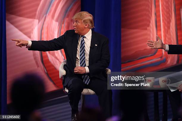 Republican presidential candidate Donald Trump answers an audience members question in a CNN South Carolina Republican Presidential Town Hall with...