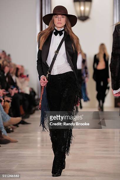 Model walks the runway at the Ralph Lauren Fall 2016 show during New York Fashion Week: The Shows at Skylight Clarkson Sq on February 18, 2016 in New...