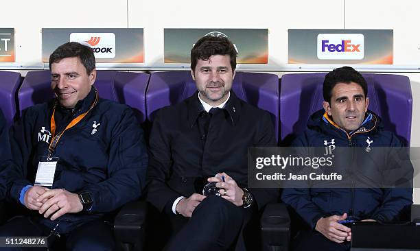 Coach of Tottenham Mauricio Pochettino seats on the bench between his assistant coaches Miguel D'Agostino and Jesus Perez during the UEFA Europa...