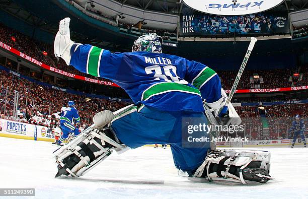 Ryan Miller of the Vancouver Canucks makes a glove save against the Anaheim Ducks during their NHL game at Rogers Arena February 18, 2016 in...