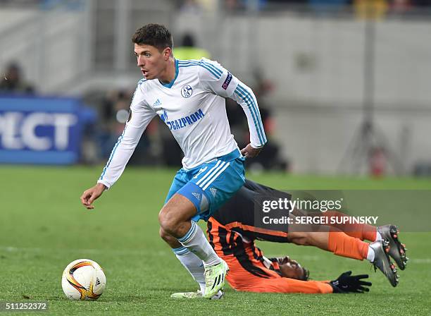 Shakhtar's Donetsk Wellington Nem and Schalke's Alessandro Schöpf vie during the UEFA Europa League, Round 32 match between Shakhtar Donetsk and FC...