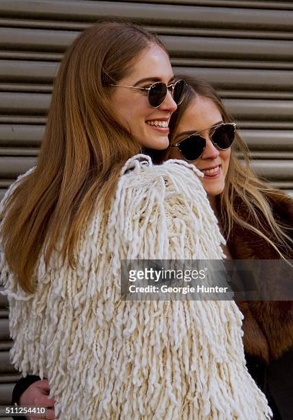 Chiara Ferragni and Valentina Ferragni seen at Skylight Clarkson Sq outside the Ralph Lauren show, Chiara wears white shag wool coat and sunglasses,...