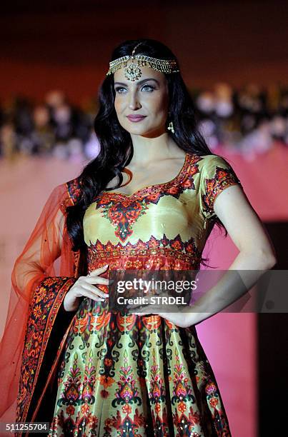 Indian Bollywood actress Elli Avram takes part in a charity fashion show in Mumbai on late February 18, 2016. AFP PHOTO / STR / AFP / STRDEL