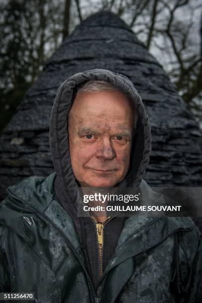 British artist Andy Goldsworthy poses near an art installation in progess, "egg-shaped cairn of slates", at the Chateau de Chaumont-sur-Loire in...