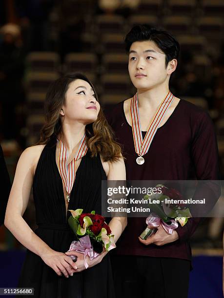 Ice Dance Champions Maia Shibutani and Alex Shibutani of United States stand on the podium after the Ice Dance Free Dance performance on day two of...