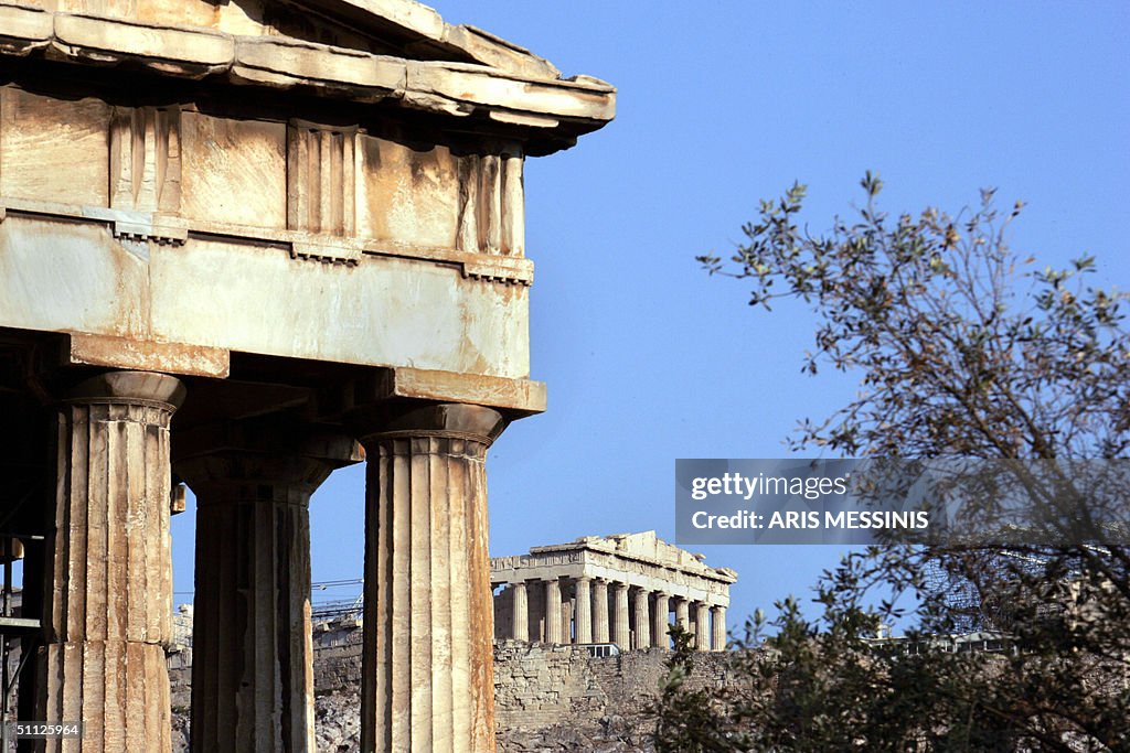 A view of the Temple of Hephaistos (L) i