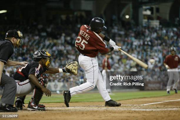 Rickie Weeks of the United States Team connects with a pitch during the New York Mercantile Exchange All-Star Futures game against the World Team at...