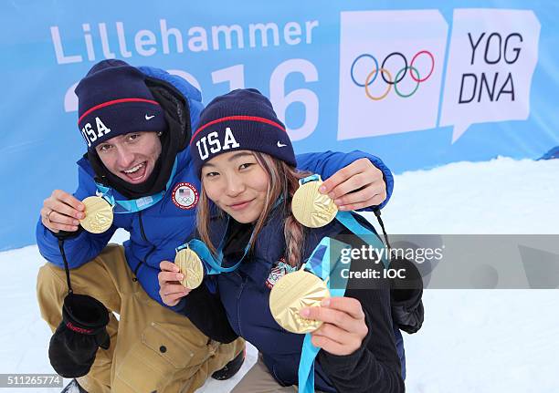 In this handout image supplied by the IOC, Jake Pates of United States and Chloe Kim of United States pose with the Gold Medals they won after the...
