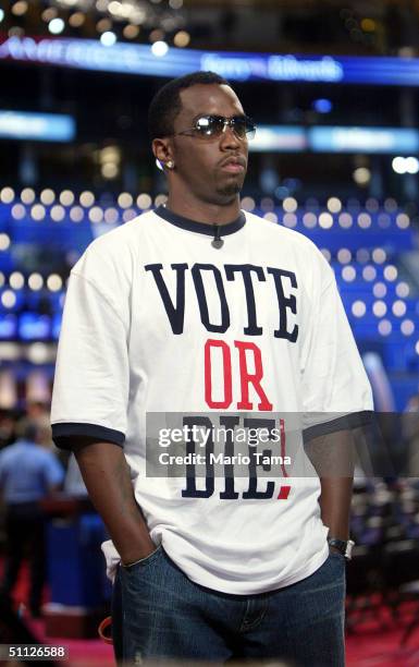 Hip-Hop star Sean "P-Diddy" Combs wears a "Vote or Die" T-Shirt during a television interview on the floor of the Democratic National Convention at...