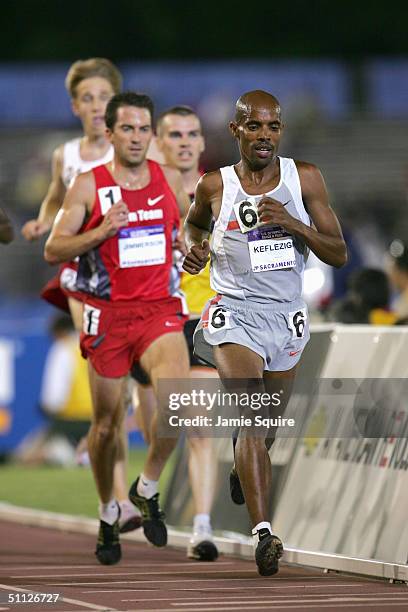 First place finisher Meb Keflezighi of Nike leads the pack in the 10000 Meter Run during the U.S. Olympic Team Track & Field Trials on July 9, 2004...
